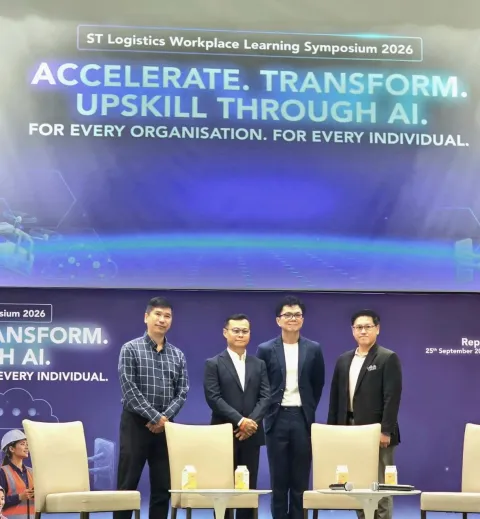 Terence Kok speaking on stage